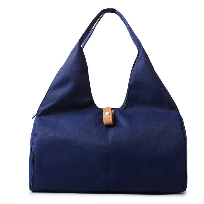 MotionMade women's sports bag in dark blue – waterproof with shoe pocket for gym and travel