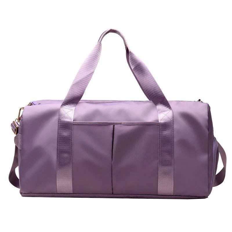 MotionMade waterproof fitness duffel bag in purple – versatile gym weekender for men and women