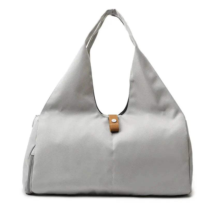 MotionMade women's sports bag in light gray – waterproof with shoe pocket for gym and travel