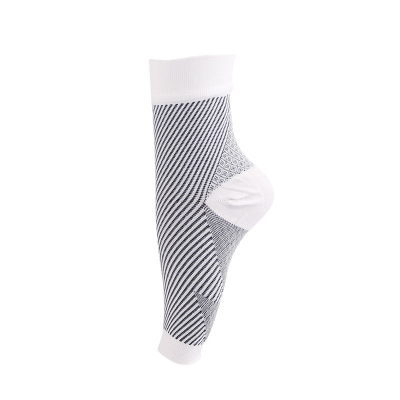 MotionMade ankle sleeve worn during squat – keeps joint locked and supported under load
