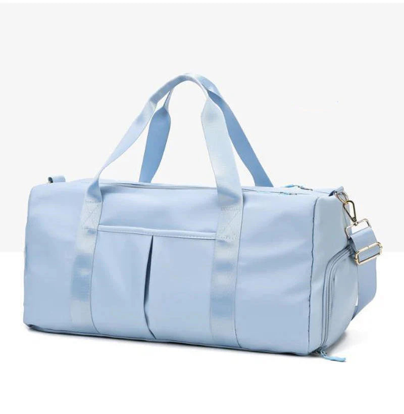 MotionMade waterproof fitness duffel bag in light blue – versatile gym weekender for men and women