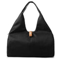 MotionMade women's sports bag in black – waterproof with shoe pocket for yoga and gym