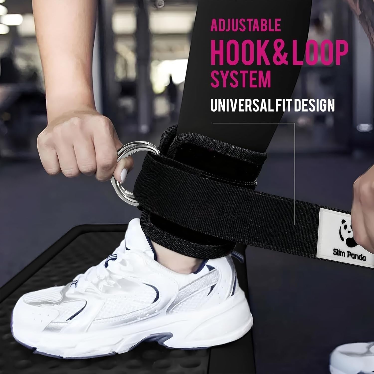 MotionMade black neoprene ankle strap with metal D-ring being secured on a person's leg for cable machine exercises.