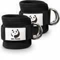 MotionMade pair of black neoprene ankle straps with heavy-duty D-rings for cable machine glute and leg workouts.