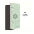 MotionMade green and black anti-slip yoga mat with mandala alignment print and included carrying strap.