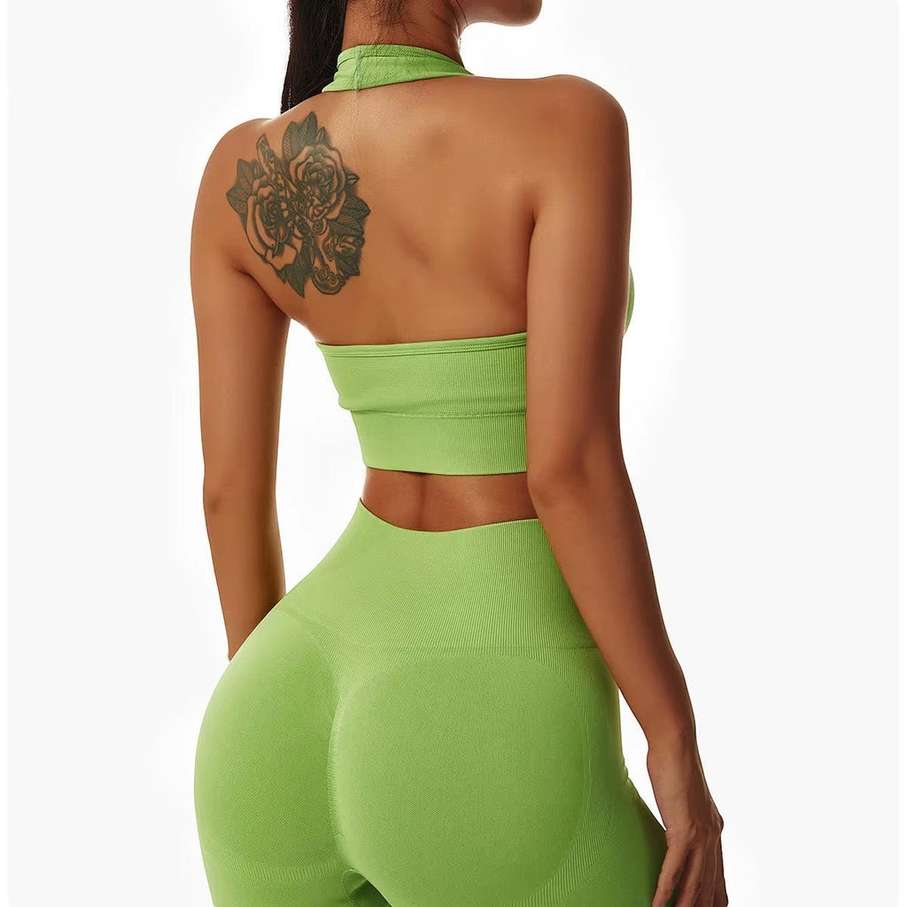MotionMade lime green seamless activewear set with high-waisted leggings and a halter sports bra for yoga and gym.